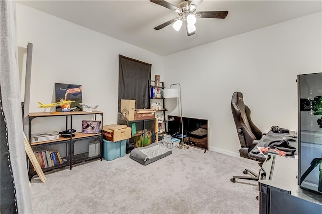 office area with ceiling fan and carpet floors