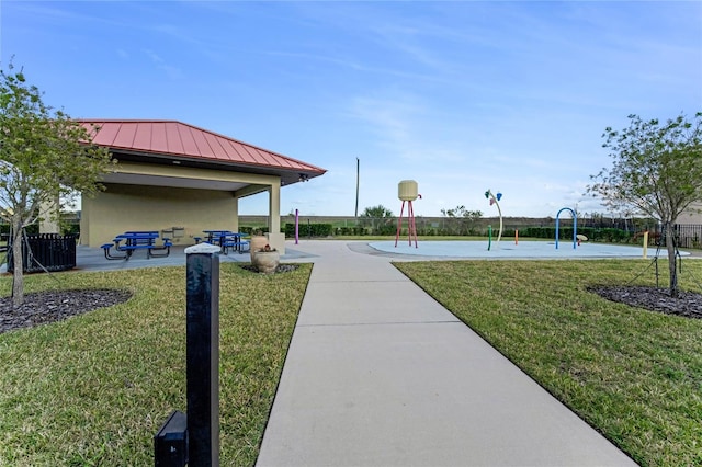 view of community featuring a lawn