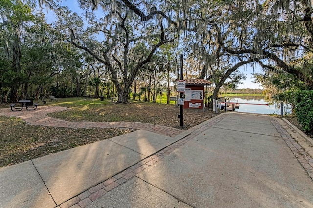 view of patio featuring a water view