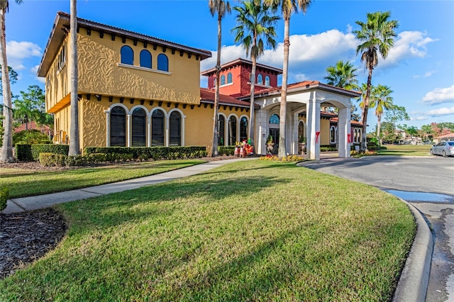 exterior space with a front lawn