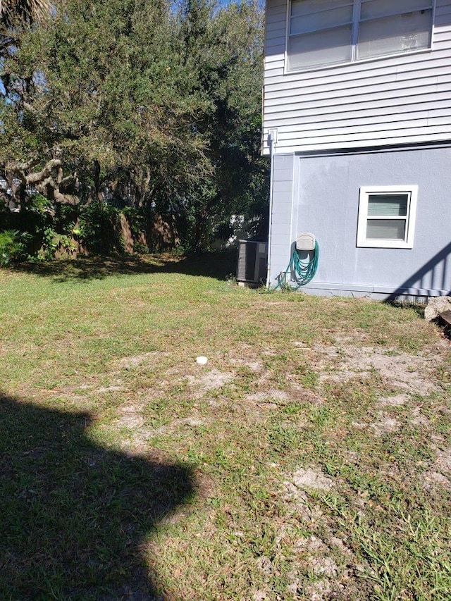 view of yard featuring cooling unit