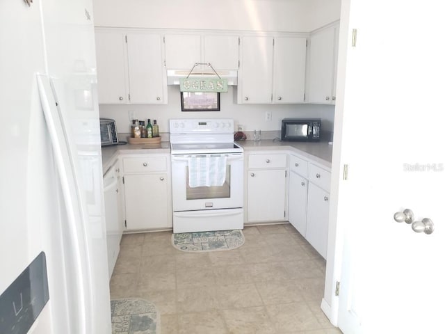 kitchen with white cabinetry, white appliances, and custom exhaust hood