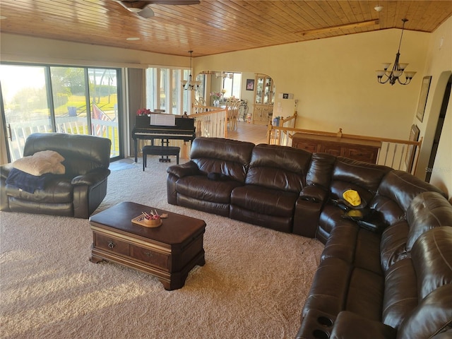 carpeted living room with ceiling fan with notable chandelier, vaulted ceiling, and wood ceiling