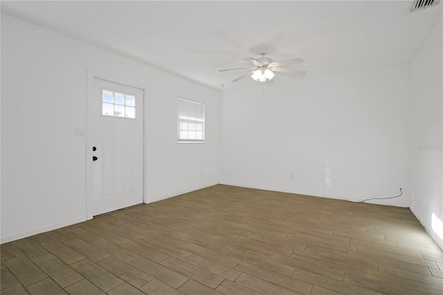 interior space featuring hardwood / wood-style floors and ceiling fan