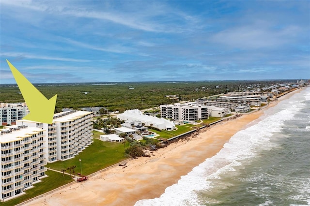 aerial view featuring a water view and a beach view