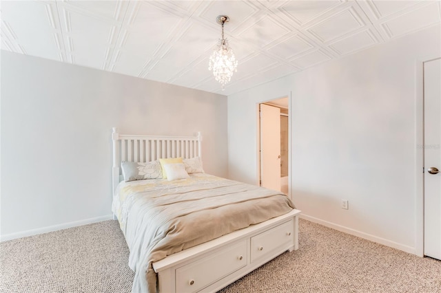 5201 S Atlantic Ave Unit 809A, New Smyrna Beach, FL 32169 - bedroom with light carpet, a chandelier, and baseboards