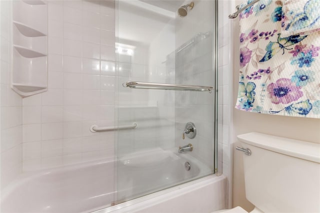 5201 S Atlantic Ave Unit 809A, New Smyrna Beach, FL 32169 - full bath featuring bath / shower combo with glass door and toilet