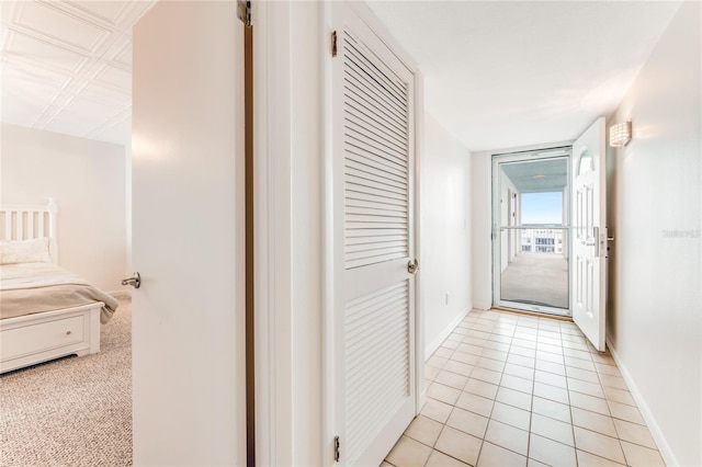 5201 S Atlantic Ave Unit 809A, New Smyrna Beach, FL 32169 - hall with baseboards and light tile patterned flooring