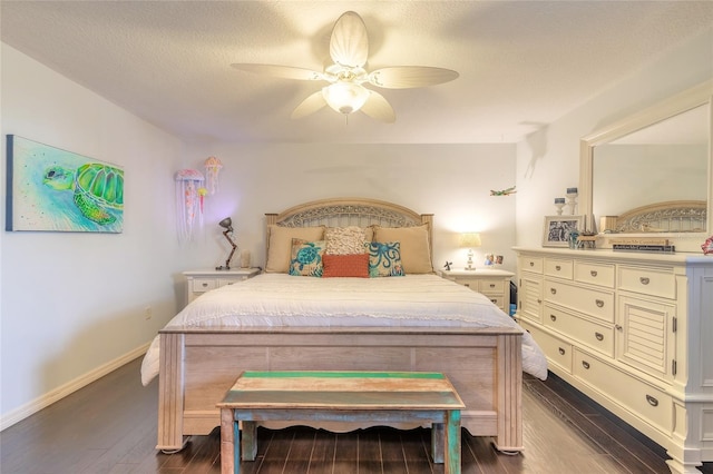 bedroom with a textured ceiling, hardwood / wood-style flooring, and ceiling fan