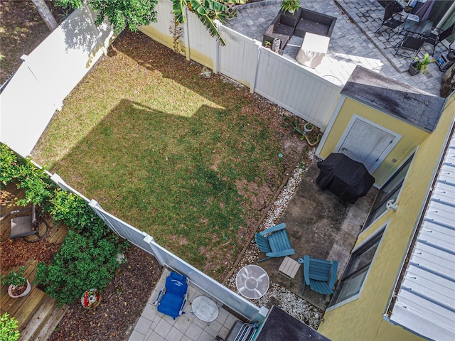 4017 Saxon Dr, New Smyrna Beach, FL 32169 - fenced backyard with a patio