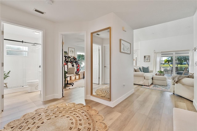 hallway featuring light hardwood / wood-style flooring