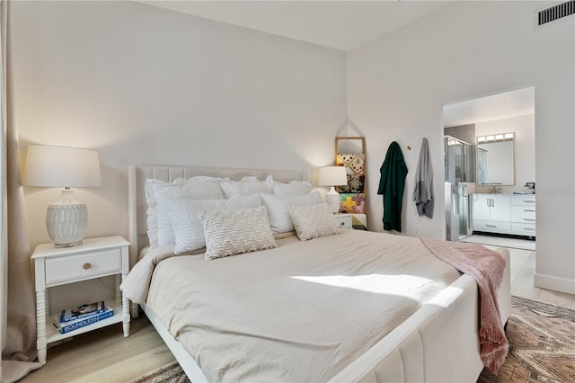 bedroom featuring light wood-type flooring