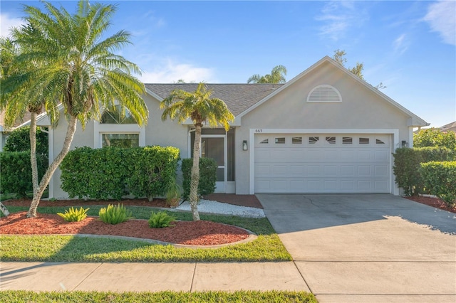 view of front of property featuring a garage