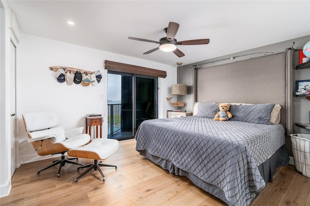 bedroom with ceiling fan, access to exterior, and light hardwood / wood-style flooring