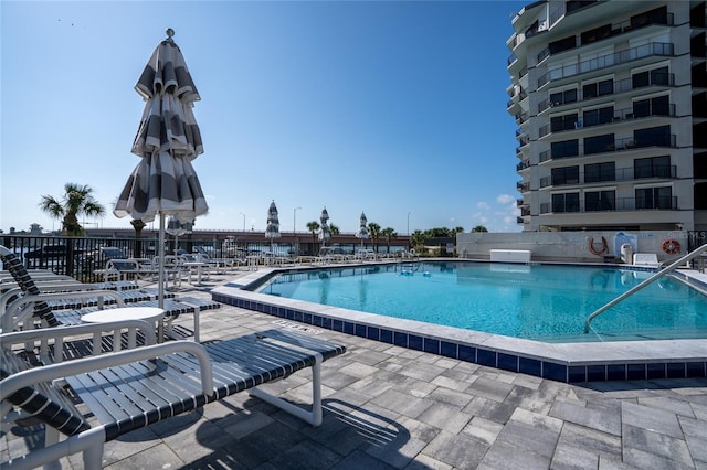 view of pool featuring a patio