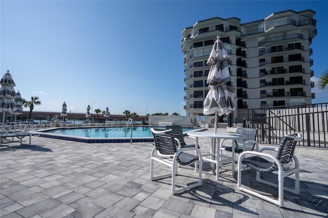 view of pool with a patio