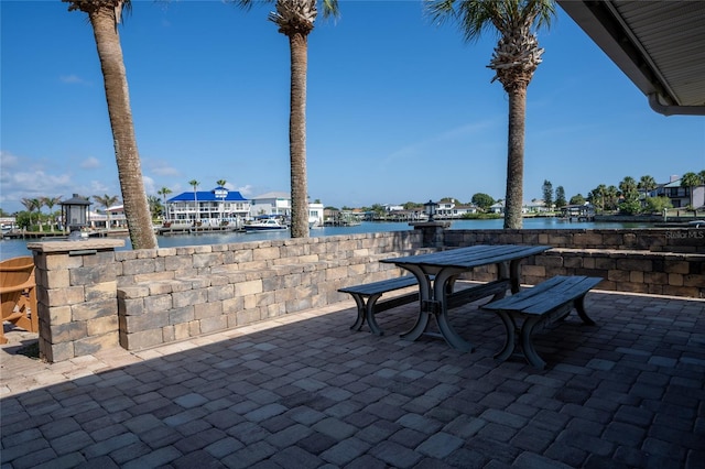 view of patio / terrace with a water view