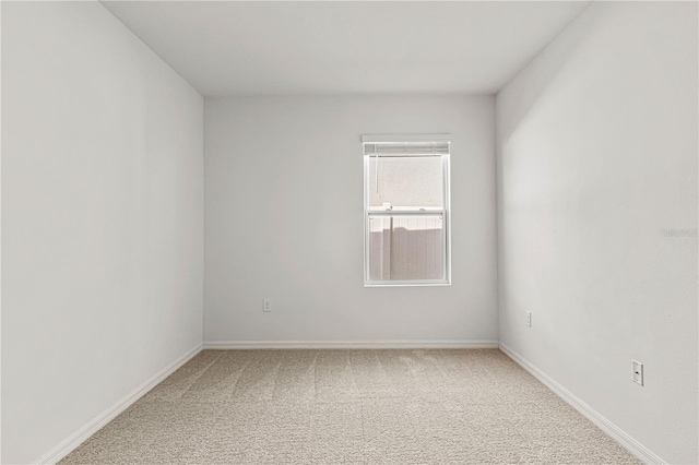 empty room with carpet floors