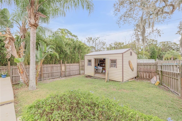 view of yard with a storage unit