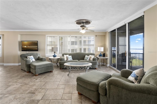 living room featuring a textured ceiling and ceiling fan