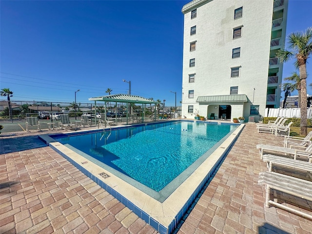 view of pool featuring a patio