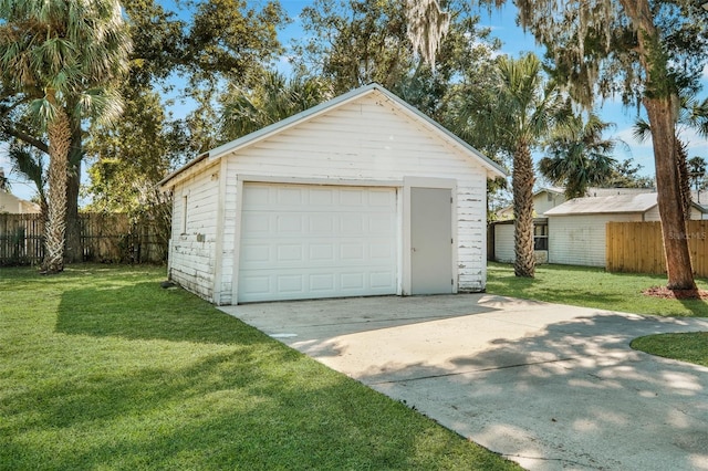 garage with a lawn