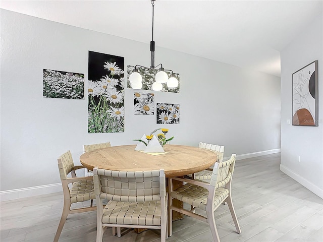 dining room featuring light hardwood / wood-style floors