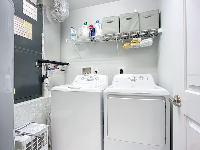 laundry room featuring washing machine and dryer