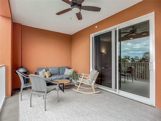 view of patio / terrace with ceiling fan and an outdoor hangout area