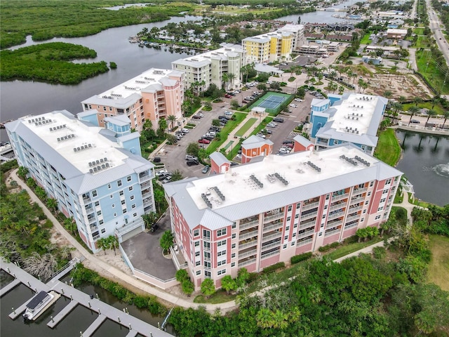 birds eye view of property featuring a water view