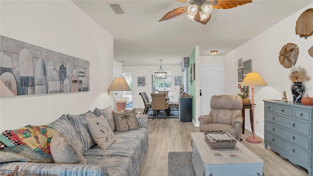 4411 Sea Mist Ct Unit 275, New Smyrna Beach, FL 32169 - living room featuring a ceiling fan and light wood-type flooring