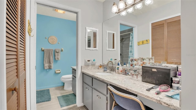 4411 Sea Mist Ct Unit 275, New Smyrna Beach, FL 32169 - bathroom with a closet, vanity, and curtained shower