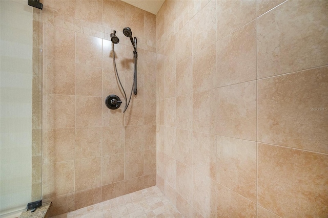 details featuring a tile shower