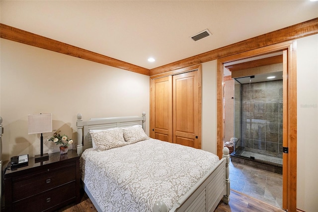 1653 N US Highway 1 Unit 201, Ormond Beach, FL 32174 - bedroom with crown molding and recessed lighting