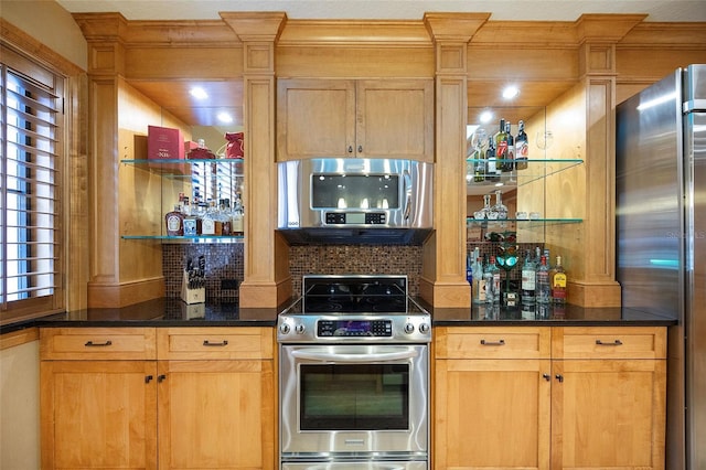 1653 N US Highway 1 Unit 201, Ormond Beach, FL 32174 - kitchen featuring appliances with stainless steel finishes, decorative backsplash, dark countertops, and open shelves