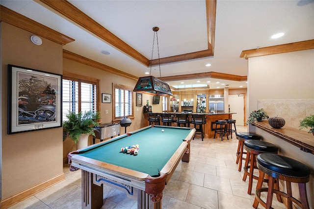 game room with bar area, crown molding, light tile patterned floors, and billiards