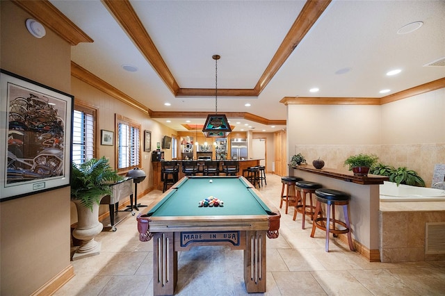 recreation room with indoor bar, ornamental molding, and billiards