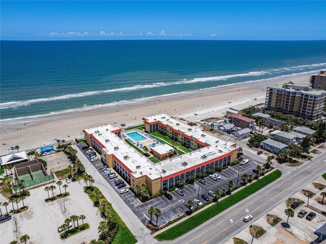 bird's eye view with a beach view and a water view