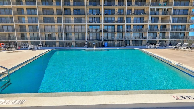 view of pool featuring a patio