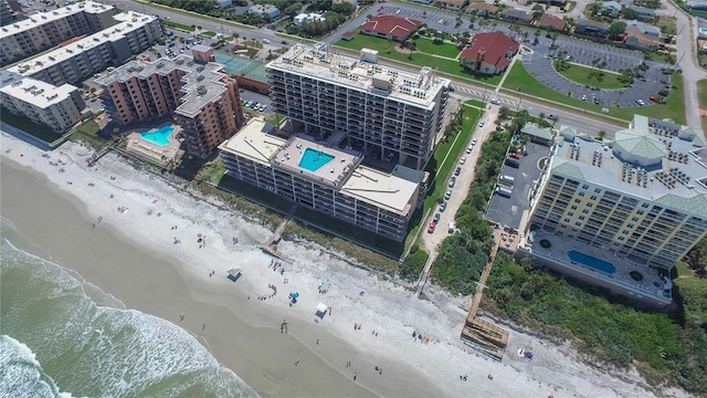 4139 Atlantic Unit A406, New Smyrna Beach, FL 32169 - drone / aerial view of a pool area and unending shoreline