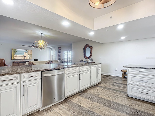 kitchen with white cabinetry, ceiling fan, dishwasher, sink, and hardwood / wood-style flooring