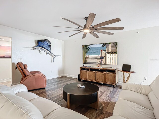 living room featuring dark wood-type flooring