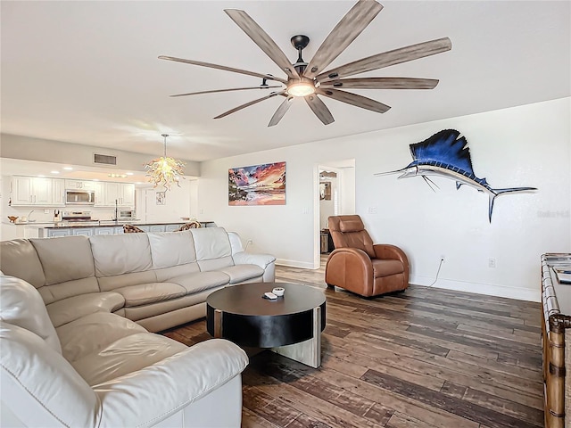 living room with dark hardwood / wood-style floors