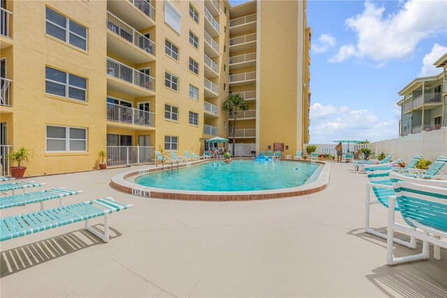 view of pool with a patio