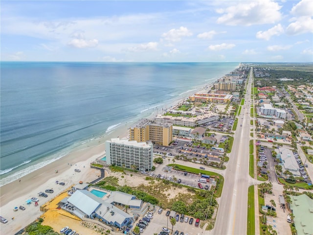 aerial view with a view of the beach and a water view