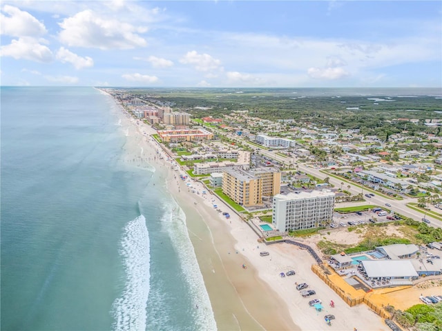 bird's eye view featuring a beach view and a water view