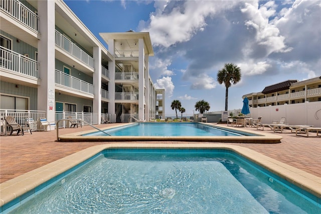 view of pool with a patio