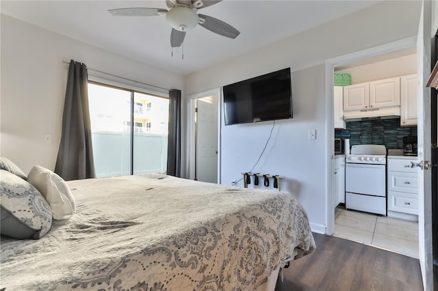 bedroom featuring dark hardwood / wood-style flooring and ceiling fan