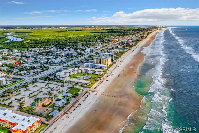 bird's eye view with a view of the beach and a water view