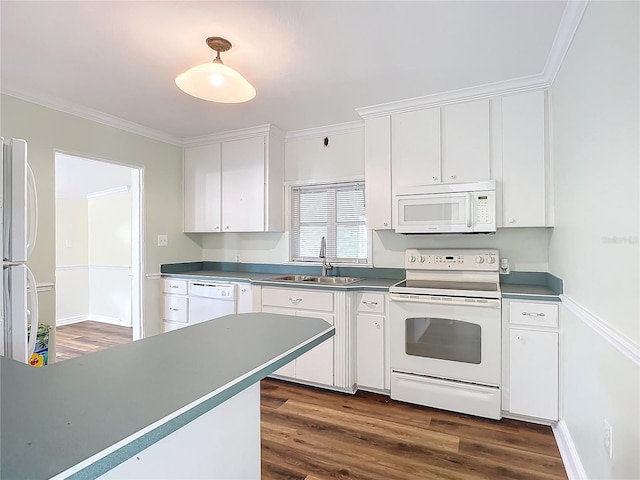 kitchen with white cabinets, dark hardwood / wood-style flooring, white appliances, and sink